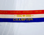 39. Liverpool Golden Jubilee Show Champion Ribbon, 1954 won by Roy Bain of Denham Court. Donated by Ian Curdie Liverpool Golden Jubilee Show Champion Ribbon, 1954 won by Roy Bain of Denham Court. Donated by Ian Curdie