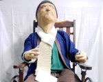 58. Wheel Chair used at the Liverpool Old Men’s Asylum c.1900 and mannequin of John Brown. Wheel Chair used at the Liverpool Old Men’s Asylum c.1900 and mannequin of John Brown.